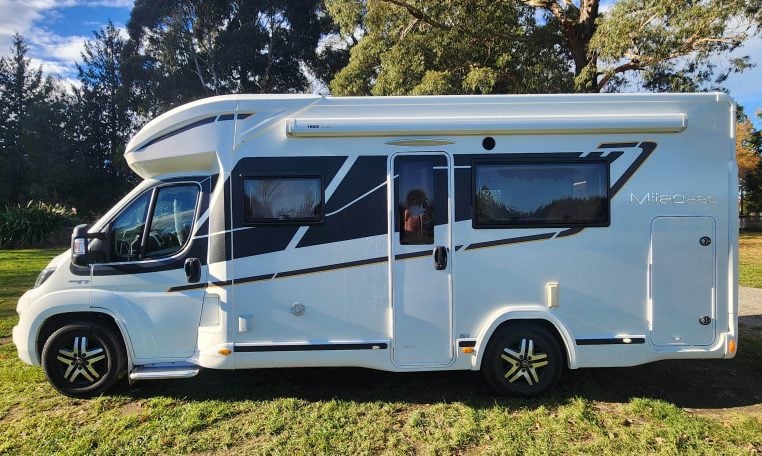 2020 Benimar Mileo 286 motorhome exterior view of the habitation door showing the awning.