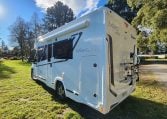2020 Benimar Mileo 286 motorhome exterior rear and habitation side view showing the awning.