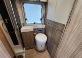 2020 Benimar Mileo 286 motorhome interior view of the bathroom showing the toilet.