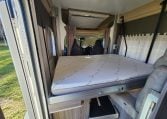 2020 Benimar Mileo 286 motorhome interior showing the electric drop-down bed.