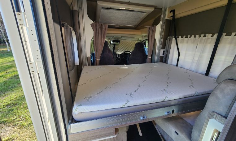 2020 Benimar Mileo 286 motorhome interior showing the electric drop-down bed.