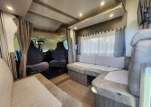 2020 Benimar Mileo 286 motorhome interior view showing the lounge area layout.