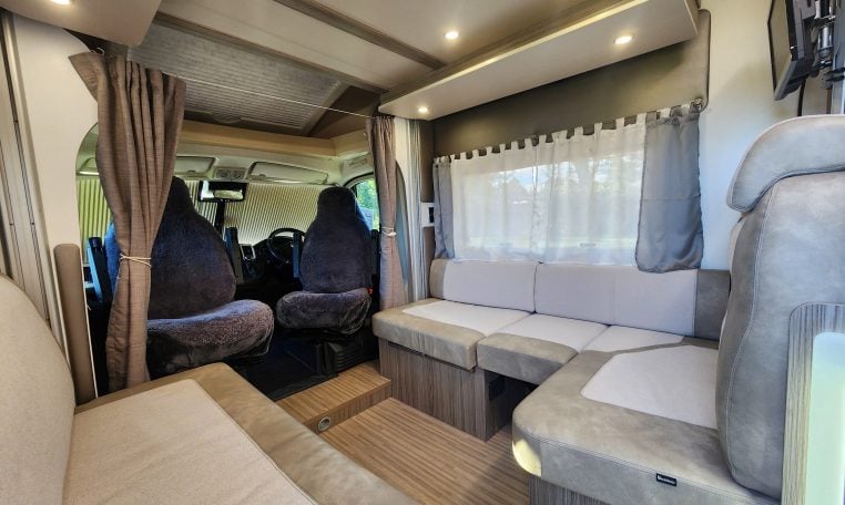 2020 Benimar Mileo 286 motorhome interior view showing the lounge area layout.