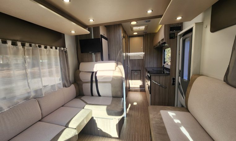 2020 Benimar Mileo 286 motorhome interior view showing the passenger seatbelts in the front lounge.