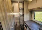 2020 Benimar Mileo 286 motorhome interior view showing the slide out pantry in the kitchen.