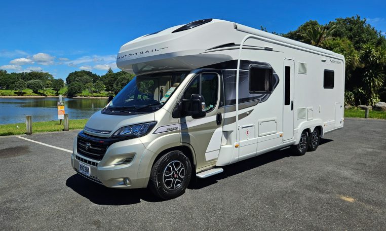 Exterior profile of the Auto-Trail Frontier Comanche motorhome showing side view, windows, and overall design layout.