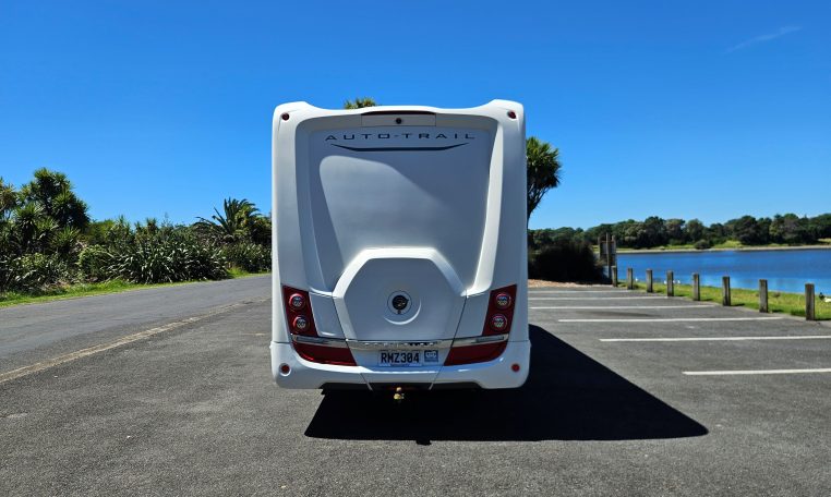 Rear view of the Auto-Trail Frontier Comanche motorhome displaying overall back profile and exterior details.