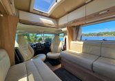 Cab swivel seats in an Auto-Trail Frontier Comanche motorhome, rotating driver and passenger seats to face the living area for added comfort.