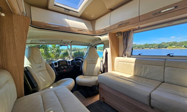 Cab swivel seats in an Auto-Trail Frontier Comanche motorhome, rotating driver and passenger seats to face the living area for added comfort.