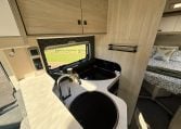 2021 Auto-Trail F-Line F74 interior view showing the compact motorhome kitchen.