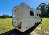 2021 Auto-Trail Frontier Comanche motorhome exterior view showing the rear and driver's side.