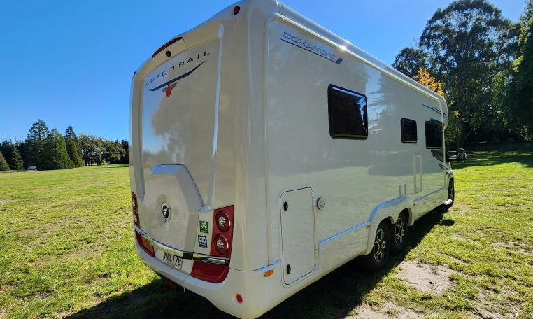 2021 Auto-Trail Frontier Comanche motorhome exterior view showing the rear and driver's side.