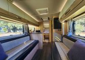 2021 Auto-Trail Frontier Comanche motorhome interior view of the high spec upholstery in the front lounge.