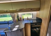 2021 Auto-Trail Frontier Comanche motorhome interior view of the kitchen with hob and oven.