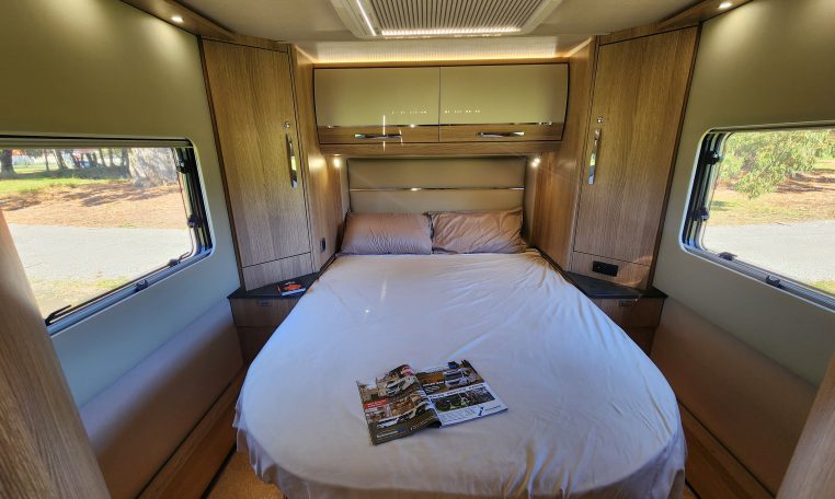 2021 Auto-Trail Frontier Comanche motorhome interior view of the spacious bedroom with a rear island bed.