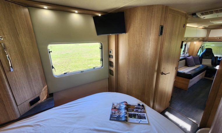 2021 Auto-Trail Frontier Comanche motorhome interior view of the TV in the bedroom.