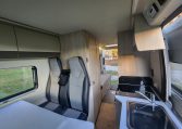 2021 Auto-Trail Tribute T680 motorhome interior view showing the passenger seatbelts.