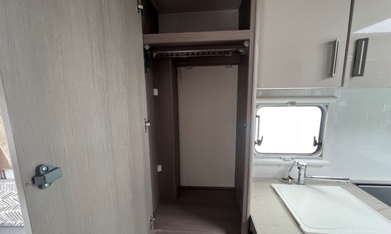 2021 Jayco Conquest FA24-4 interior view of the cupboard for storage.