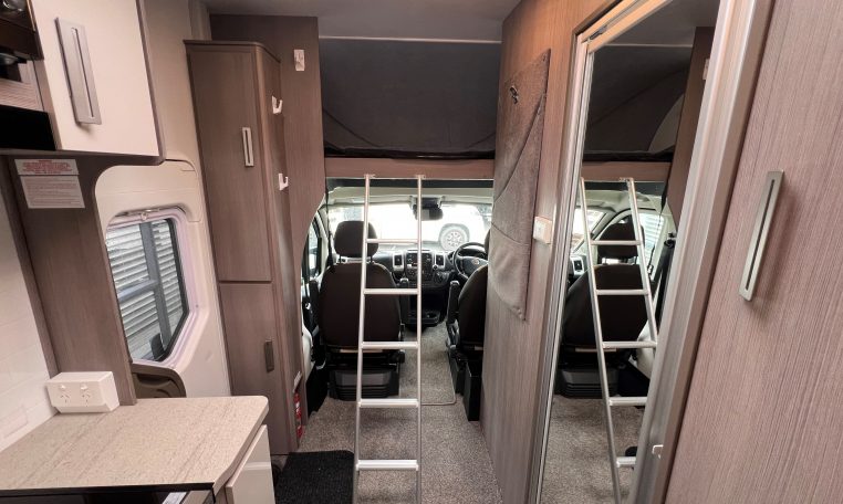 2021 Jayco Conquest FA24-4 interior view of the ladder leading to the luton bed.