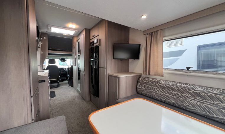 2021 Jayco Conquest FA24-4 interior view of TV in the rear lounge.