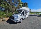 Exterior profile of the Auto-Trail F-Line F62 motorhome showing side view, windows, and overall design layout.