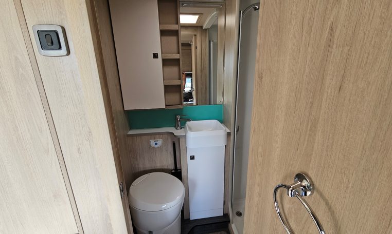 Interior view of the Auto-Trail F-Line F62 motorhome bathroom with shower and modern design.