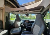 Cab swivel seats in an Auto-Trail F-Line F62 motorhome, rotating driver and passenger seats to face the living area for added comfort.