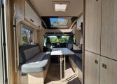 Auto-Trail F-Line F62 motorhome dining area with comfortable seating and a bright, open living space.