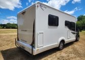 2022 Pre-owned Auto-Trail F-Line F74 4-berth motorhome, exterior view of the back and driver's side.