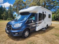 2022 Pre-owned Auto-Trail F-Line F74 4-berth motorhome, exterior view of the front and habitation door.