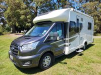 Exterior profile of the 2022 Pre-owned Auto-Trail F-Line F74 motorhome showing side view, windows, and overall design layout.