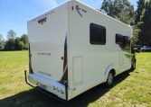 2022 Pre-owned Auto-Trail F-Line F74 4-berth motorhome, exterior view of the back and driver's side.
