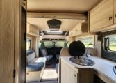 2022 Pre-owned Auto-Trail F-Line F74 4-berth motorhome, interior view of the electric drop-down bed put up and out the way.