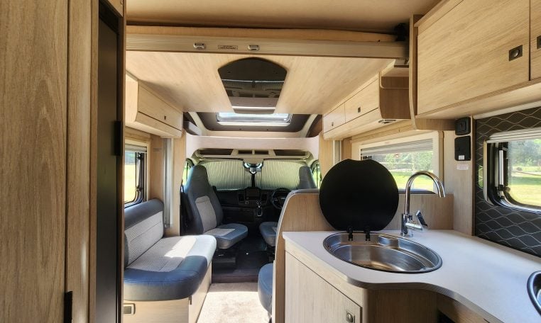 2022 Pre-owned Auto-Trail F-Line F74 4-berth motorhome, interior view of the electric drop-down bed put up and out the way.
