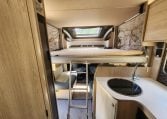 2022 Pre-owned Auto-Trail F-Line F74 4-berth motorhome, interior view of the electric drop-down bed.