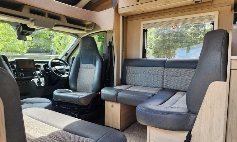 Pre-owned 2022 Auto-Trail F-Line F74 4-berth motorhome, interior view of the generous lounge area.