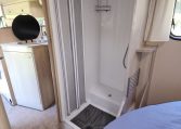 Pre-owned 2022 Auto-Trail F-Line F74 4-berth motorhome, interior view of the convenient separate shower.