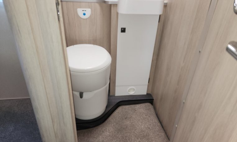Pre-owned 2022 Auto-Trail F-Line F74 4-berth motorhome, interior view of the bathroom with the toilet.