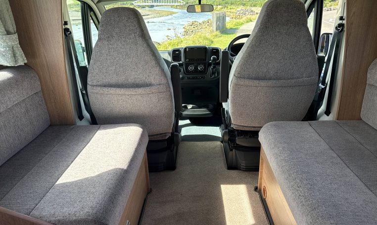 2022 Auto-Trail Imala 730 motorhome interior showing the comfortable bench seating.