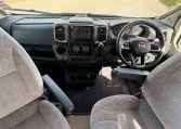 2022 Auto-Trail Imala 730 motorhome interior showing the front cab steering wheel and dash.