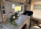 2022 Auto-Trail Imala 730 motorhome interior showing the large benchtop space in the kitchen.