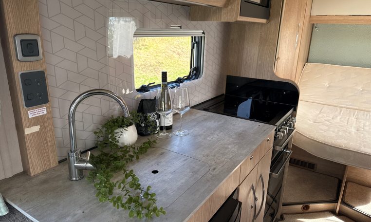 2022 Auto-Trail Imala 730 motorhome interior showing the large benchtop space in the kitchen.