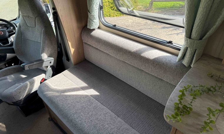 2022 Auto-Trail Imala 730 motorhome interior showing the luxury fabric upholstery.