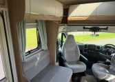 2022 Auto-Trail Imala 730 motorhome interior showing the overhead storage in the living area.