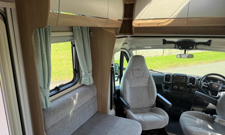 2022 Auto-Trail Imala 730 motorhome interior showing the overhead storage in the living area.