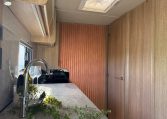 2022 Auto-Trail Imala 730 motorhome interior showing the bedroom door, providing privacy from the main living area.