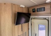 2022 Auto-Trail Imala 730 motorhome interior showing the TV in the living area.