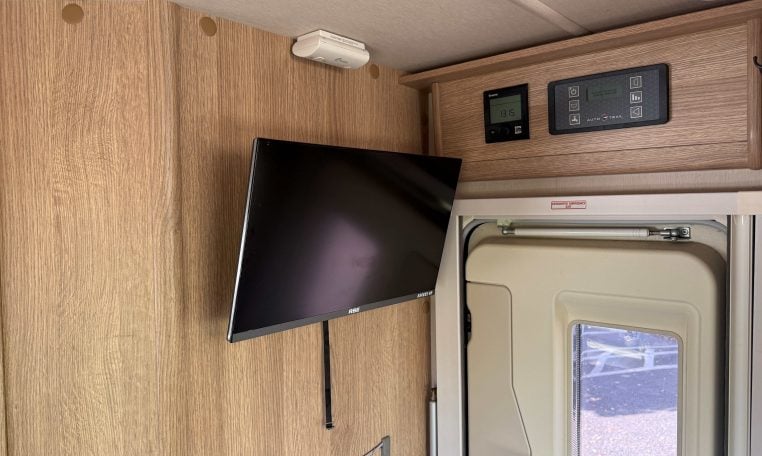 2022 Auto-Trail Imala 730 motorhome interior showing the TV in the living area.
