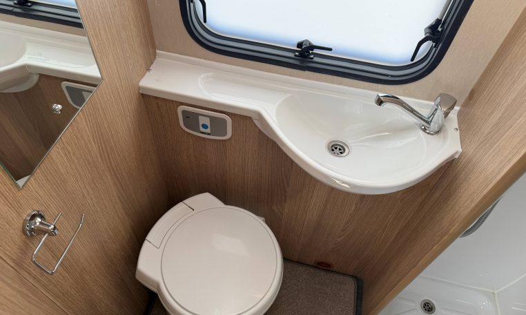2022 Auto-Trail Imala 730 motorhome interior showing the compact toilet.