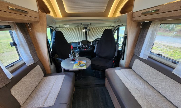 2022 Auto-Trail Tracker RB motorhome interior view of the front lounge bench seats.